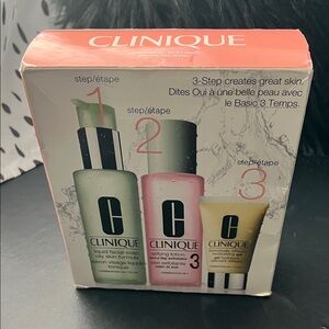 Clinique Skincare Trio with Green, Pink, and Yellow Bottles